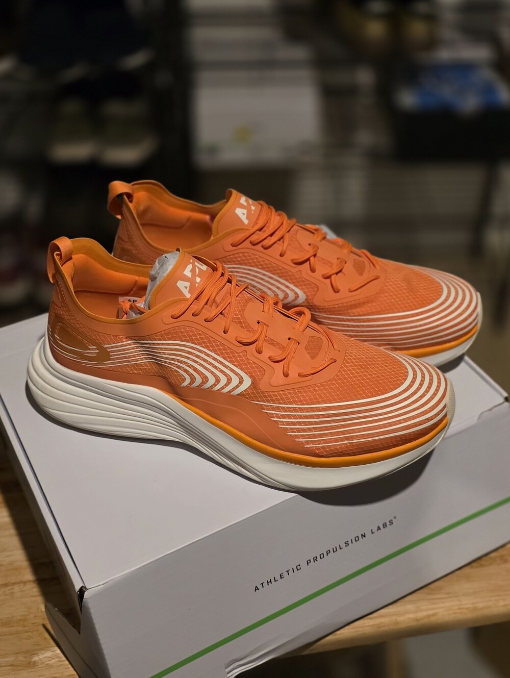 APL Orange Mesh Running Sneakers with White Accents Streamline